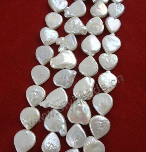 Pearl,cultured freshwater,white,11-12mm heart, AAA grade. Sold per pkg of one strand