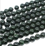 Bead, green goldstone (manmade), 8mm round. Sold per 16-inch strand