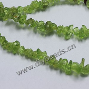 Bead, peridot (natural), small chip. Sold per 35-inch strand