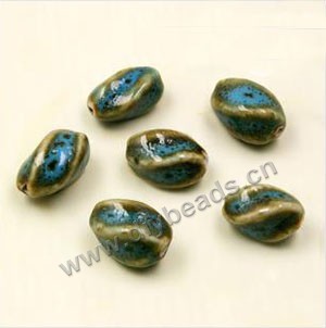 Bead, fancy glaze porcelain, blue, 16x10mm twisted oval. Sold per pkg of 20 beads 