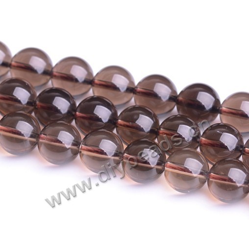 Bead, smoky quartz (heated/irradiated), 20mm round. Sold per 15-inch strand