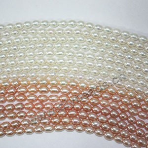 Pearl,cultured freshwater (natural), white/peach/mauve, 5-6mm rice, A grade. Sold per pkg of (3)16-inch strands.