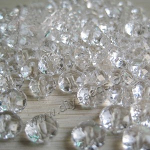 Bead, acrylic,clear, 8mm faceted rondelle. Sold per 200-gram pkg, approximately 1140 beads.