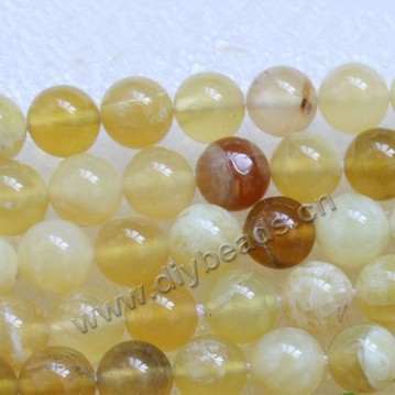 Bead, yellow"opal" (natural), 8mm round. Sold per 15-inch strand.