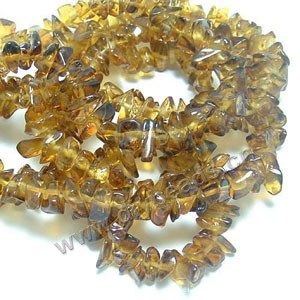 Glass chip beads, amber yellow, small. 36-inch strand.