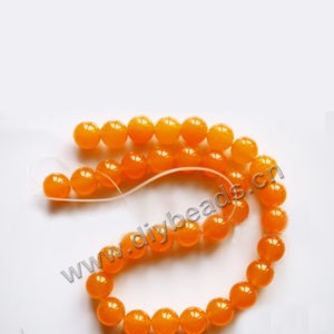 Bead, yellow "jade" (dyed), 6mm round. Sold per 15-inch strand