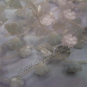 Bead, cat's eye glass,  white, 9x12mm carved flower. Sold per 16-inch strand.approximately 8 beads.