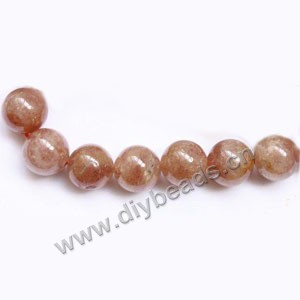 Bead, strawberry quartz (natural), 12mm round, Sold per 15-inch strand