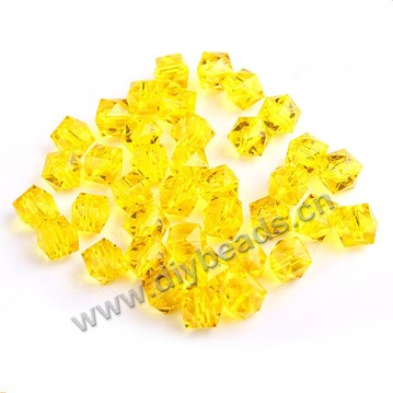 Bead, acrylic, lemon yellow, transparent, 10mm faceted cube. Sold per 100-gram pkg.