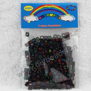 Bead, acrylic,black with colorful alphabet, 6x6mm cube with 4mm drill hole. Sold per pkg of 250