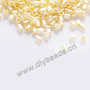 Bugle bead,taiwan, glass, silky luster, light yellow,#1 (2x2mm)hex beads. Sold per pkg of 500 grams,approximately 40,000ps