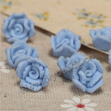 Bead, polymer clay,blue,9x5mm flower. Sold per pkg of 5.