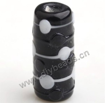 Bead,lampworked glass,black round tube with white bumpy spots. 18*9mm. Sold per pkg of 5.