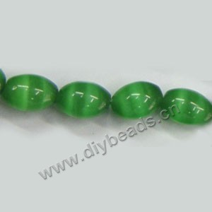 Bead, cat's eye glass, green ,9x6mm oval. Sold 15-inch strands.