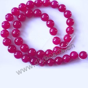 Bead, fuchsia "jade" (dyed), 10mm round. Sold per 15-inch strand,approximately 40 beads .