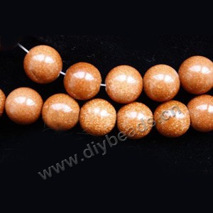 Bead, brown goldstone (manmade), 12mm round. Sold per 14.5-inch strand