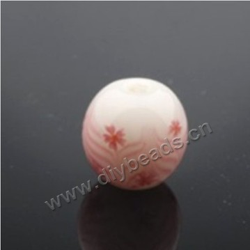 Bead, lampworked glass ,pink with flower, 14x14mm round.mini order 50pc 