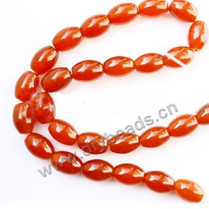 Bead, red agate (dyed), 6x9mm oval. Sold per 15-inch strand.