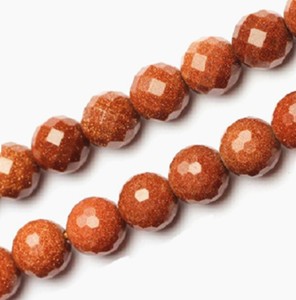 Bead, brown goldstone (manmade), 12mm 128-faceted round. Sold per 14.5-inch strand