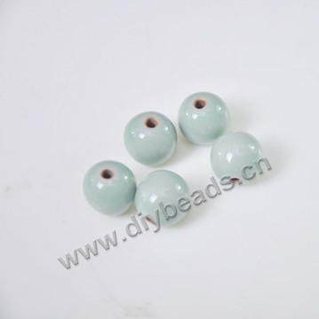 Bead , fancy glaze porcelain,cyan, 8mm round. Sold per pkg of 50 beads. 