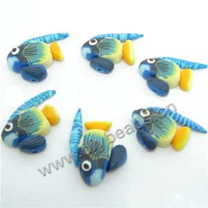 Bead, polymer clay,blue/yellow, 12x6x4mm fish. Sold per pkg of 12.