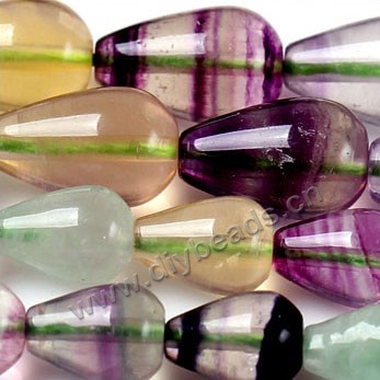 Bead, rainbow fluorite (natural), 8x12mm teardrop. Sold per 15-inch strand.