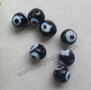 Bead, lampworked glass, opaque black, 8mm round with 3 wards off  evil eye design. Sold per pkg of 20.