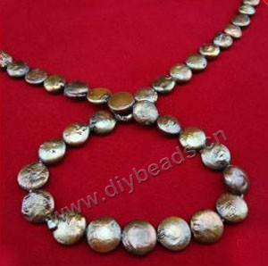 Pearl baroque, cultured freshwater (dyed),copper, 12-13mm flat round, Mohs hardness 2-1/2 to 4. Sold per pkg of (10) 16-inch strands.