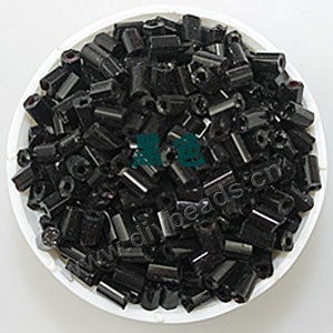 Bugle bead, glass,silky luster,black,#1 (3x2mm)beads. Sold per pkg of 80 grams,approximately 4,500ps.
