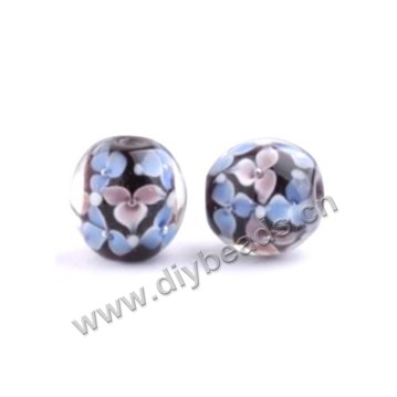 Bead, lampworked glass,purple with flower, 16x16mm round.mini order 50pc 