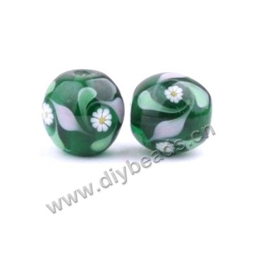 Bead, lampworked glass,green with flower, 16x16mm round.mini order 50pc 