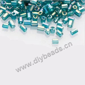 Bugle bead,taiwan, glass, silver-lined and rainbow aqua blue ,#1(2x2mm) hex beads. Sold per pkg of 500 grams,approximately 40,000ps 