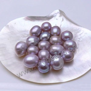 Pearl, cultured freshwater ,mauve, 12-13mm half-drilled rice, AAA grade. Sold per pkg of 1pair