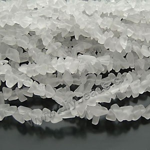 brush glass chip beads, white, small. 34-inch strand.
