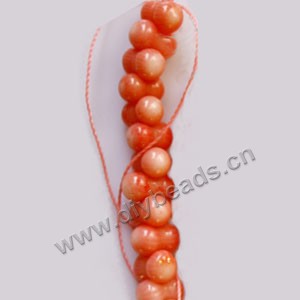 Bead, pink coral (imitation), 8x5mm peanut. Sold per 15-inch strand,approximately 95 ps.