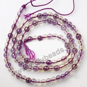 Bead, ametrine (imitation), 4mm  round,sold per 15-inch strand,approximately  95ps.