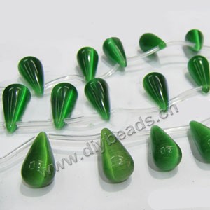 Bead, cat's eye glass,  green, 11x22mm top-drilled teardrop. Sold per 15-inch strand.