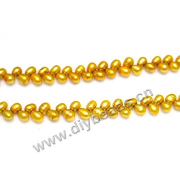 Bead baroque, cultured freshwater pearl, gold, 5-6mm oval, Sold per 15.5 inch strand.