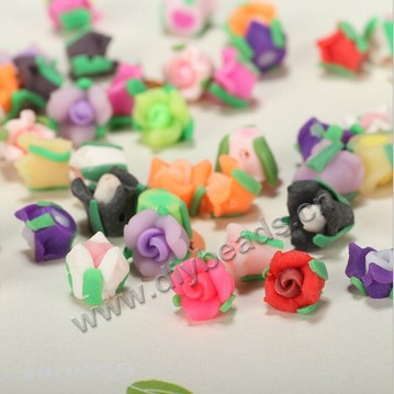Bead, polymer clay,mixed color,9x7mm flower. Sold per pkg of 5.