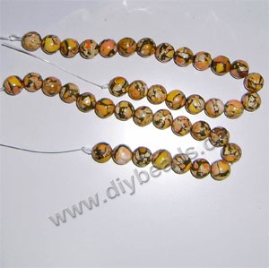 Bead, howlite (dyed), orange, 10mm round. Sold per 16-inch strand .factory price.