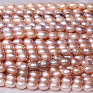 Pearl mix, cultured freshwater pearl (Natural), white / peach / mauve, 10-11mm rice,C grade. Sold per pkg of (20) 15-inch strands.