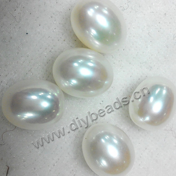 Pearl, cultured fresh water  pearl ,8.5--9mm,white peach mauve, rice shape for earrings no hole. Sold by  pcs