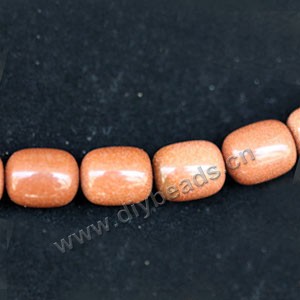 Bead, brown goldstone (manmade), 10x12mm round tube. Sold per 16-inch strand