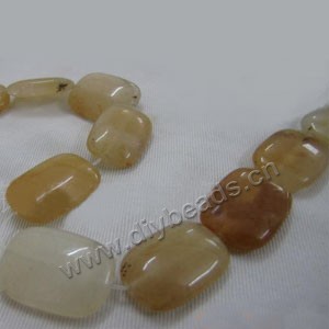 Bead, yellow "jade" (natural), 18x25mm rounded puffed rectangle . Sold per 15-inch strand