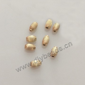Bead,copper,14k gold filled,oval,3x5mm with 1.2mm hole,Sold per pkg of 10 pieces.