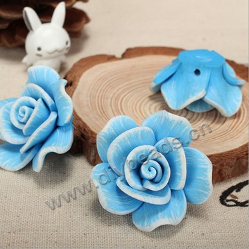 Bead, polymer clay,blue,40x20mm flower. Sold per pkg of 50.