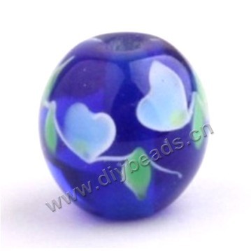 Bead, lampworked glass,blue with flower, 16x16mm round.mini order 50pc 