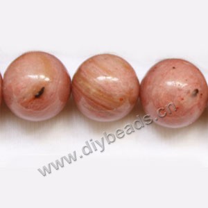 Bead, rhodonite (natural), 12mm round. Sold per 15-inch strand