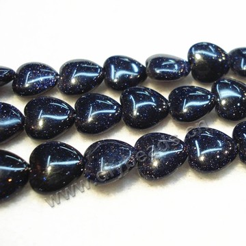 Bead, blue goldstone (manmade), 10mm puffed heart. Sold per 16-inch strand