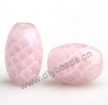 Bead,lampworked glass,pink, 15*10mm oval with fish scale design. Sold per pkg of 5.